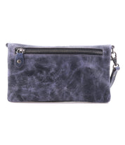 The Cadence by Bed Stu is a compact, rectangular dark blue leather clutch featuring a front zipper pocket and detachable wrist strap—perfect for carrying your essentials in style.