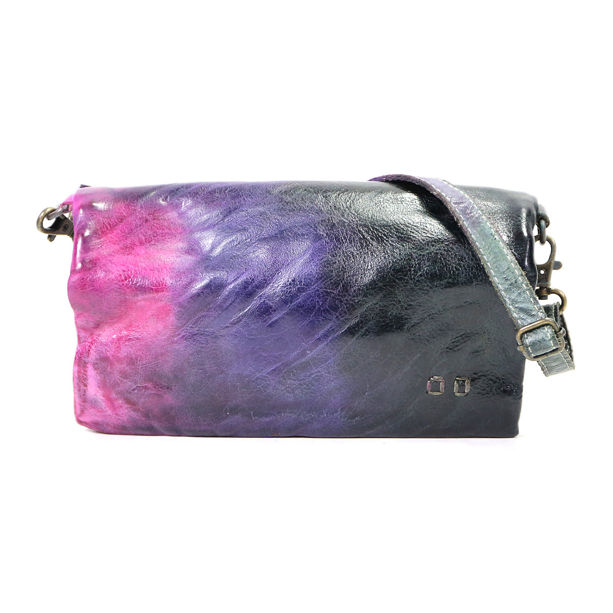A colorful metallic Cadence crossbody clutch from Bed Stu with a gradient purple to pink pattern and a silver chain, isolated on a white background.