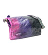 A small iridescent Cadence makeup bag with a pink and purple color gradient and a metal magnet closure, set against a white background by Bed Stu.
