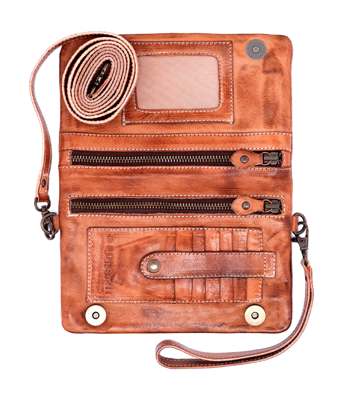 The Bed Stu Cadence is a brown leather compact wallet featuring multiple zip compartments, card slots, an ID window, and a detachable wrist strap—versatile enough to be used as a clutch for any occasion.