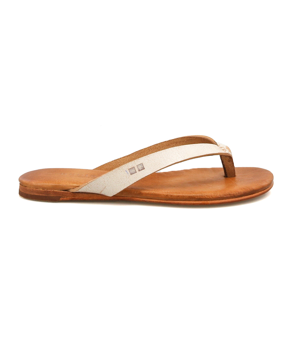 The Bed Stu Calma is a brown leather flip-flop sandal featuring a white strap and flat sole, shown from the side against a white background.