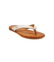 The Bed Stu Calma is a lightweight, comfortable tan leather flip-flop sandal featuring a metallic beige thong strap, shown on a white background—ideal for relaxing footwear.