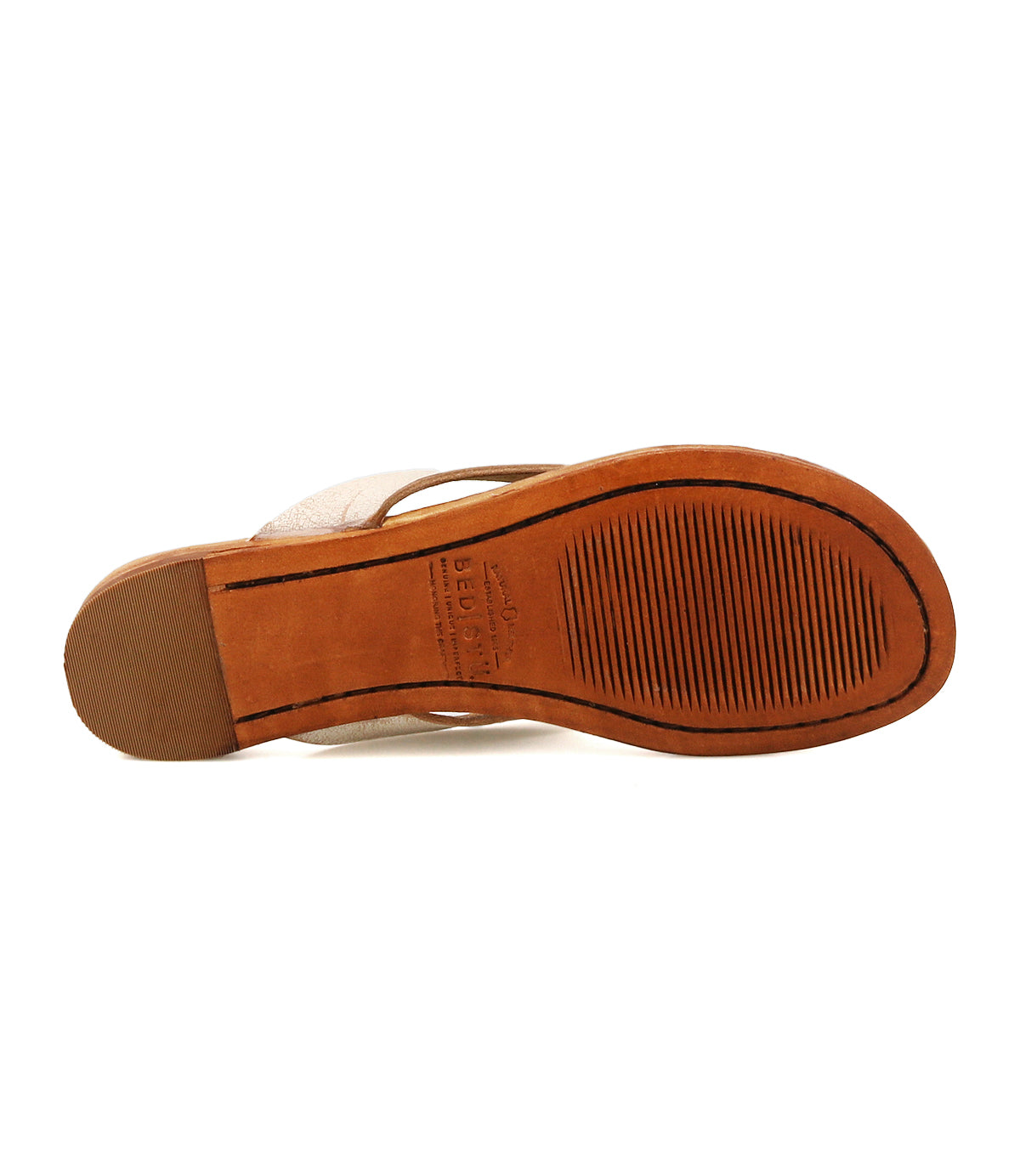 Bottom view of the Bed Stu Calma tan leather sandal sole featuring a textured rubber grip at the front and smooth leather at the heel and arch, offering everyday comfort and relaxed style.