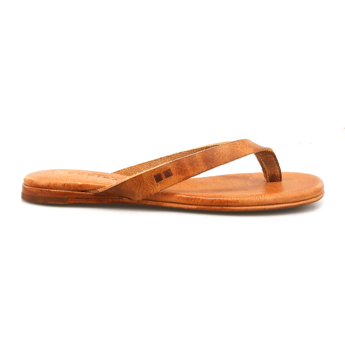 The Bed Stu Calma is a brown leather thong sandal with a flat sole, shown from the side on a white background—a lightweight, comfortable choice for relaxing days.
