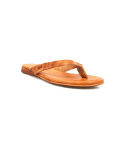 The Bed Stu Calma sandal, a single brown leather thong sandal with a flat sole, is displayed on a white background. Designed for lightweight comfort.