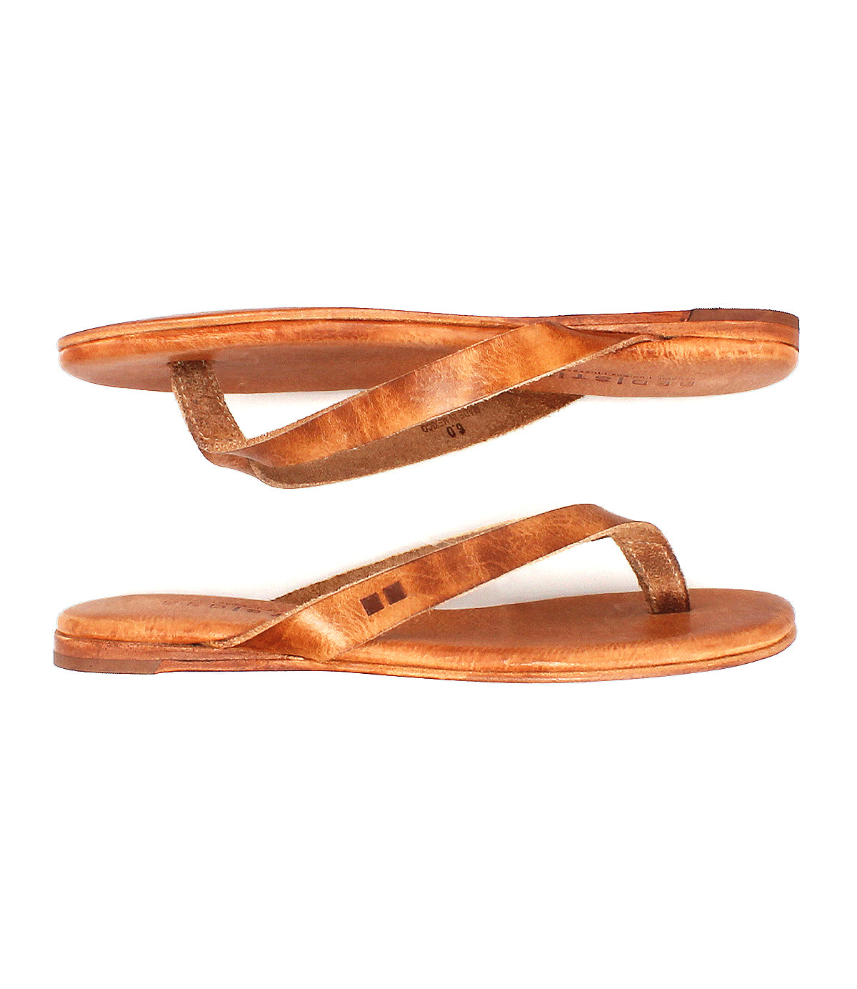 The Bed Stu Calma sandals, crafted from brown leather and known for their lightweight comfort, are displayed side-on with one sandal positioned above the other.