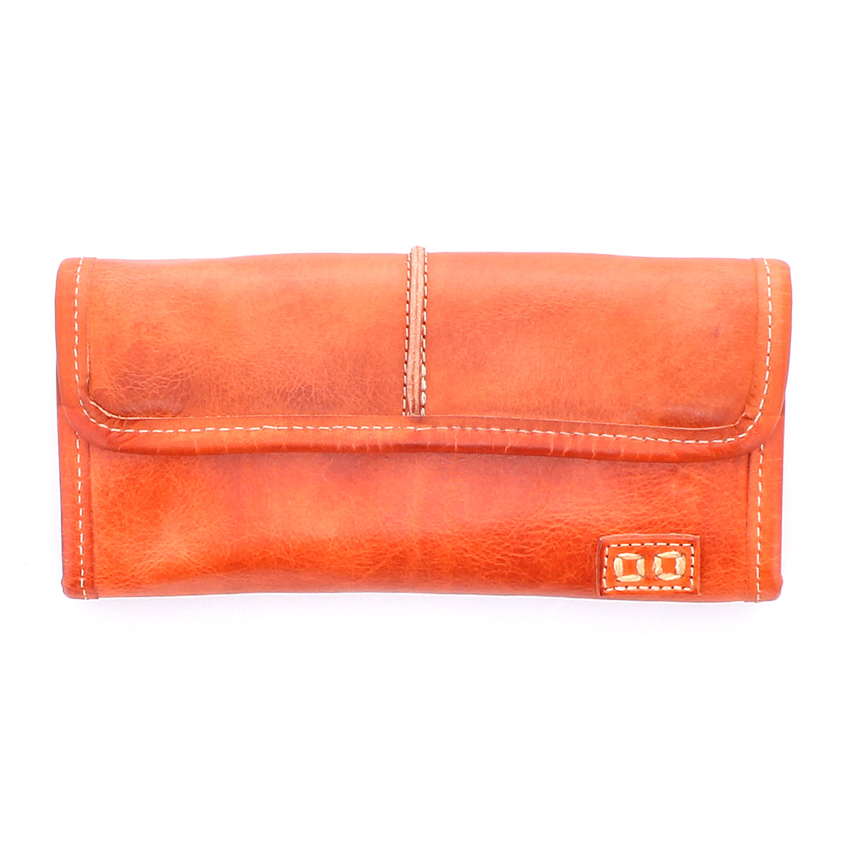 The Bed Stu "Canton" is a closed brown leather wallet with elegant white stitching, displayed against a crisp white background. This stylish design features convenient card slots for organized storage.