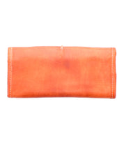 The Canton leather pouch by Bed Stu, featuring white stitching and a chic clutch design, provides ample space for essentials when viewed from the side.