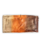 The Canton by Bed Stu is a compact leather wallet featuring a gradient design in shades of brown, orange, and beige.