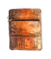 Sleek and fashionable, the Canton open brown leather wallet by Bed Stu includes a zippered pocket, card slots, and button snaps. Ideal for anyone who values an accessory that blends practicality with sophistication.