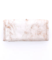 A scuffed, aged Canton wallet by Bed Stu has worn card slots and a weathered tan leather surface.