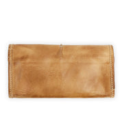The Canton wallet by Bed Stu, designed for organizing essentials, highlights its smooth brown leather texture and visible fold against a white background.