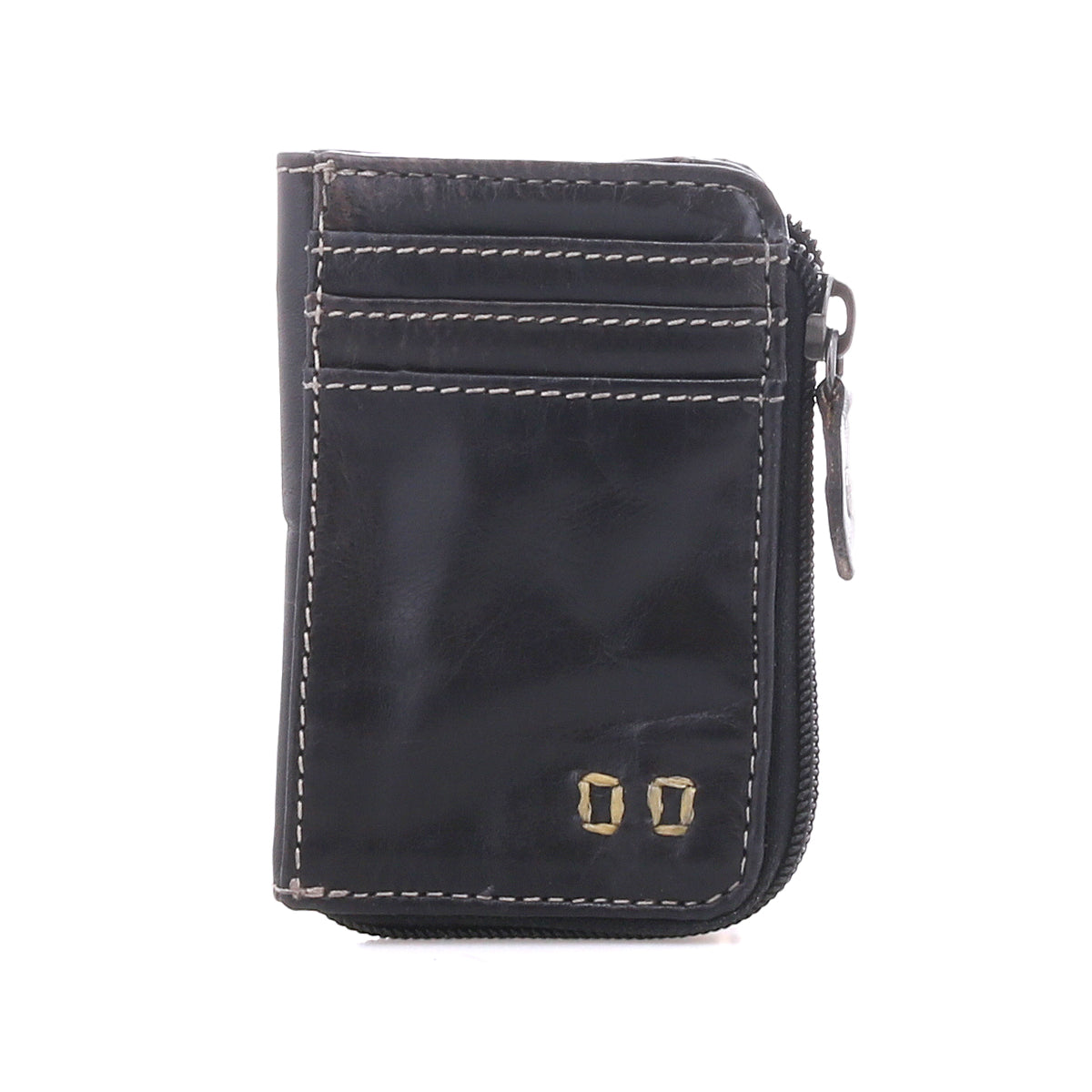 The Carrie wallet by Bed|Stü is a small, black compact leather accessory featuring white stitching, gold metal accents, three easy-access card slots, and a zippered side compartment, shown against a white background.