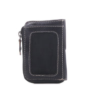 Carrie by Bed|Stü is a black compact leather wallet, featuring white stitching and a zipper, displayed closed and upright against a white background. This slim design offers easy-access card slots for added convenience.