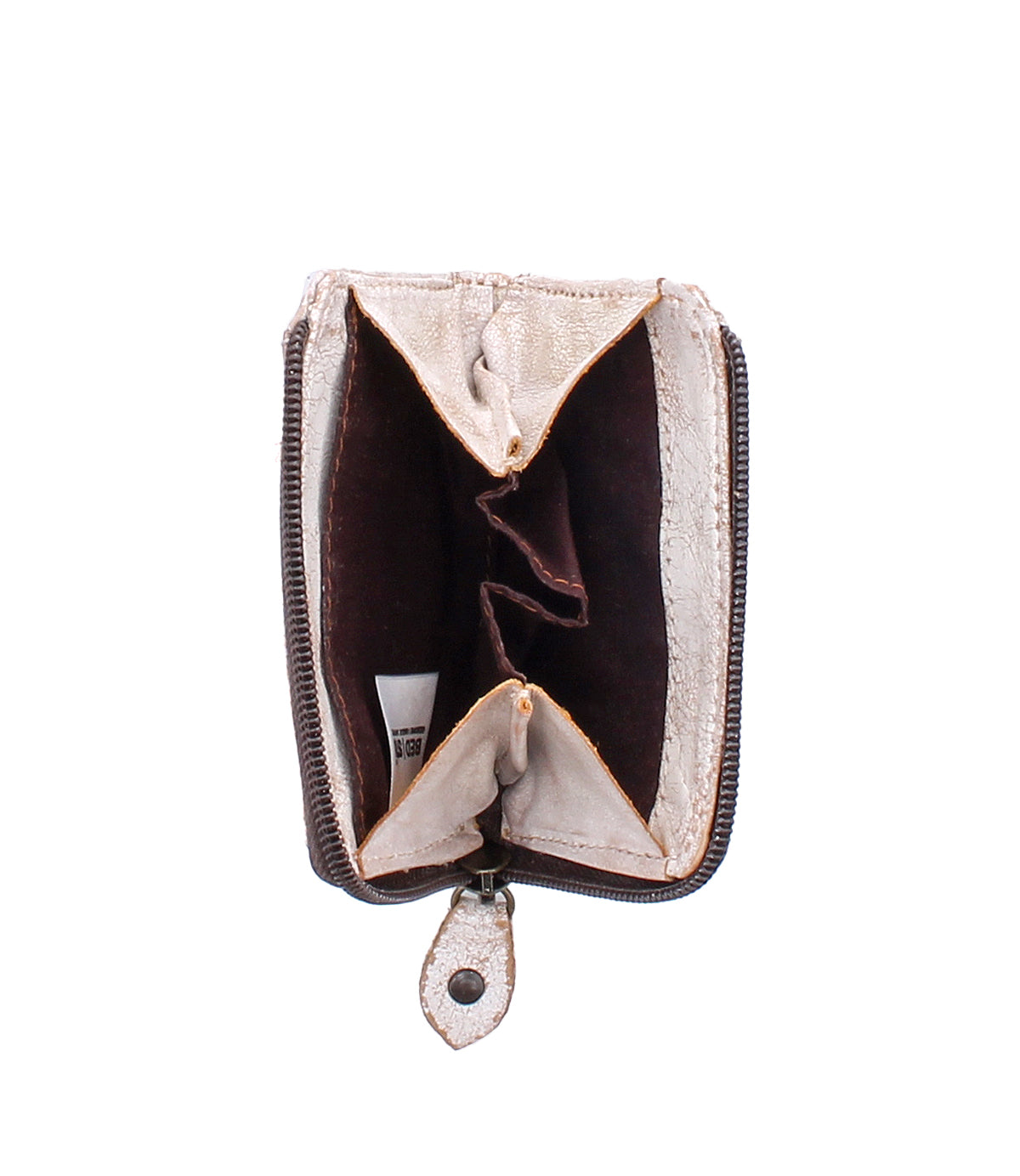 Open and empty Carrie compact leather wallet in brown and beige by Bed|Stü, featuring visible card slots and a zip compartment, photographed from above.