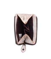 Open and empty Carrie compact leather wallet in brown and beige by Bed|Stü, featuring visible card slots and a zip compartment, photographed from above.