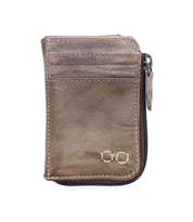 The Carrie by Bed|Stü is a compact brown leather wallet featuring visible stitching, easy-access card slots, and a zippered edge, photographed against a white background.