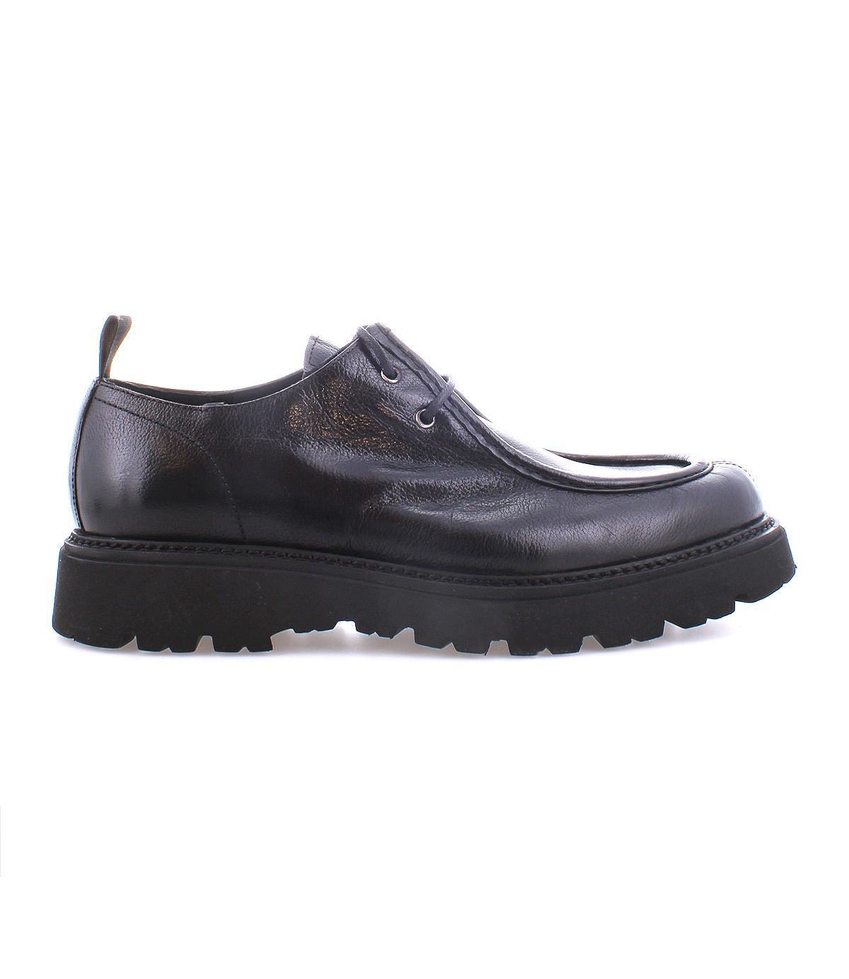 The Casotto by Bed Stu is a men's boot that displays exquisite Italian craftsmanship and a touch of retro flair, featuring black leather with lace-up detailing and a thick, rugged sole visible from the side.