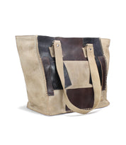 A brown and black leather Bed Stu tote bag featuring a zip-top closure, called the Celindra LTC II.