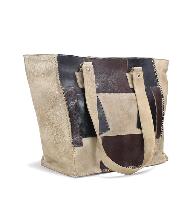 A brown and black leather Bed Stu tote bag featuring a zip-top closure, called the Celindra LTC II.