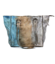 The Bed Stu Celindra LTC is a versatile zip-top tote bag that is perfect for your shopping adventures. Made of high-quality leather, this bag features durable straps for comfortable carrying.