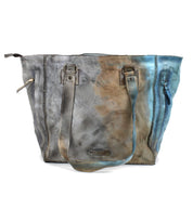 A close up of a Bed Stu Celindra LTC zip-top tote.