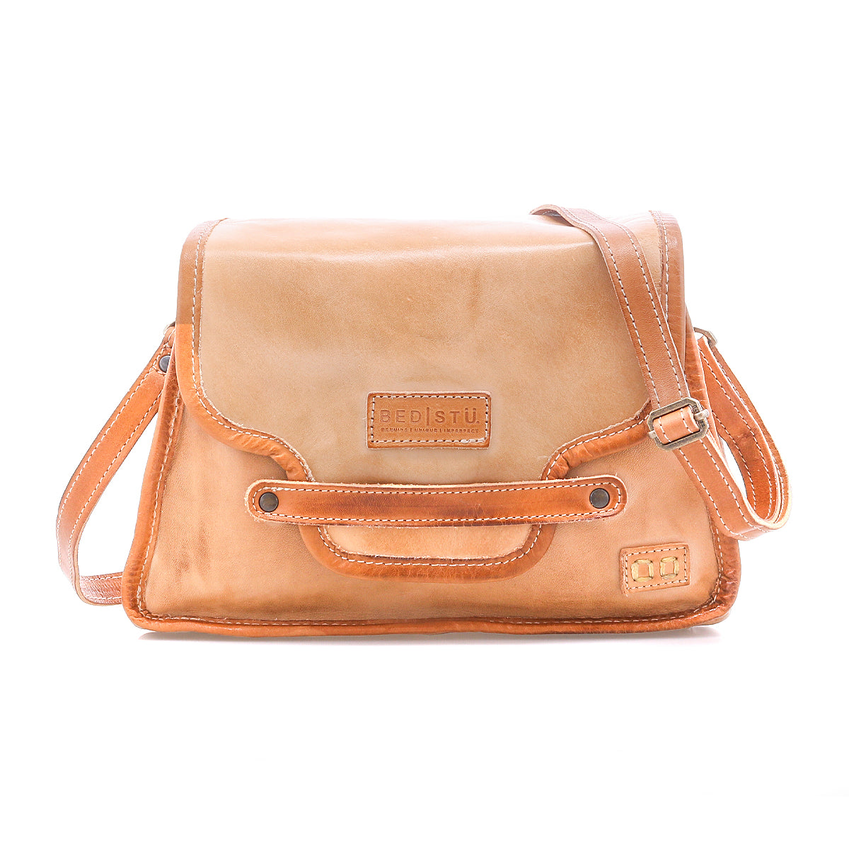 The Ceremonious by Bed Stu is a light brown leather flap-top bag with an adjustable shoulder strap and front logo—a perfect preppy accessory to keep you organized in style.