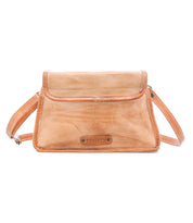 The Ceremonious by Bed Stu is a light brown leather flap-top bag with visible stitching, an adjustable strap, and logo on the front—a stylish, organized handbag ideal for everyday use.