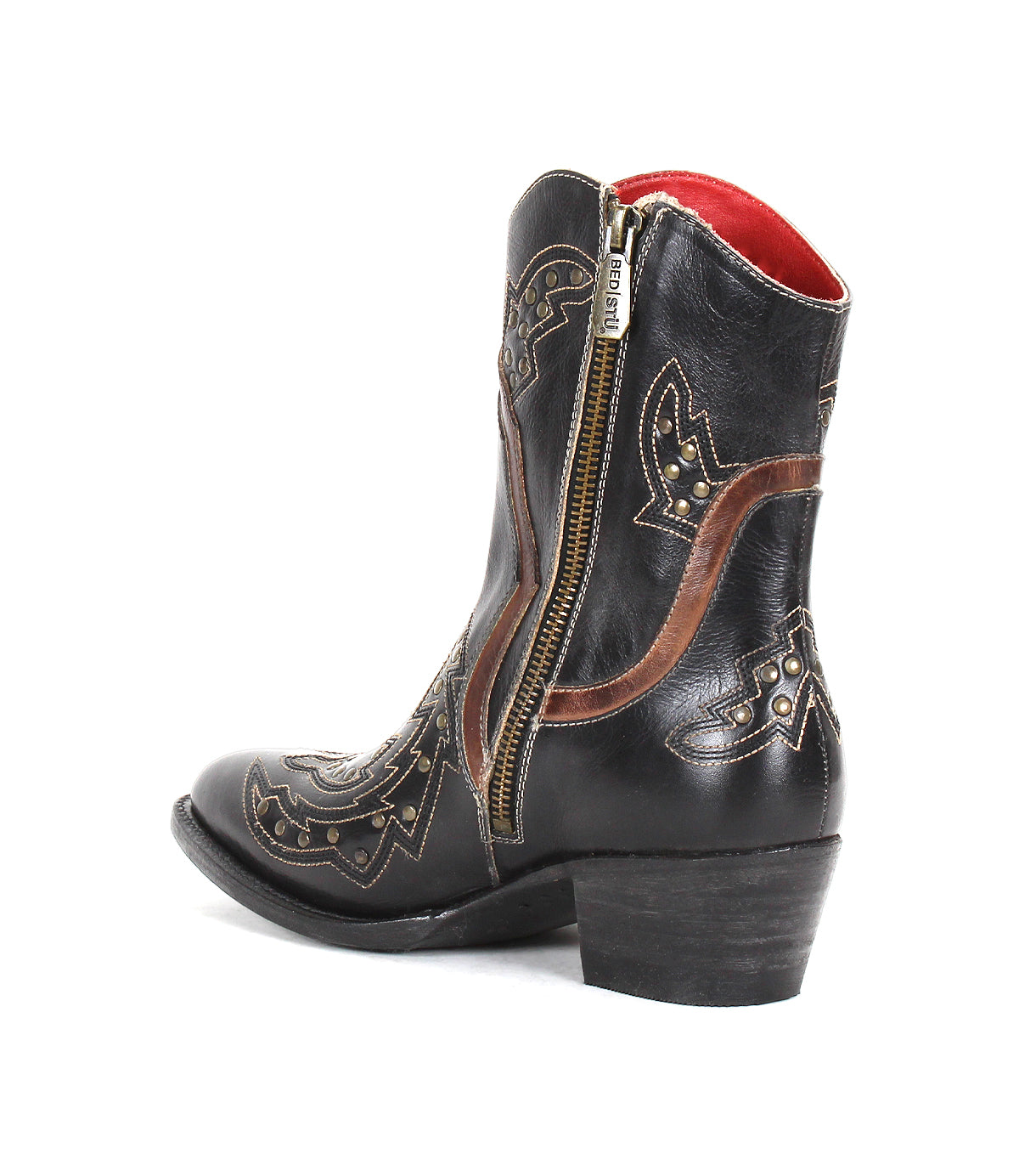 The Bed Stu Chamise boot is shown against a white background, featuring black leather, brown embroidery, gold studs, a snip toe, side zipper, and low heel.