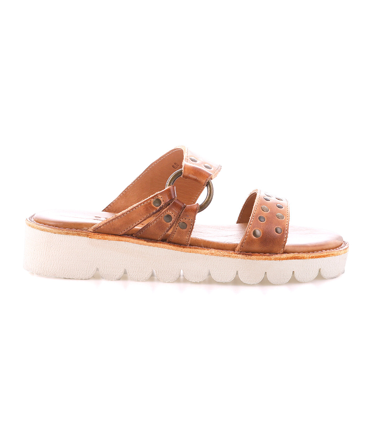 The Bed Stu Chow sandal features distressed leather, studded straps, and a chunky rubber sole, shown from the side against a plain background.