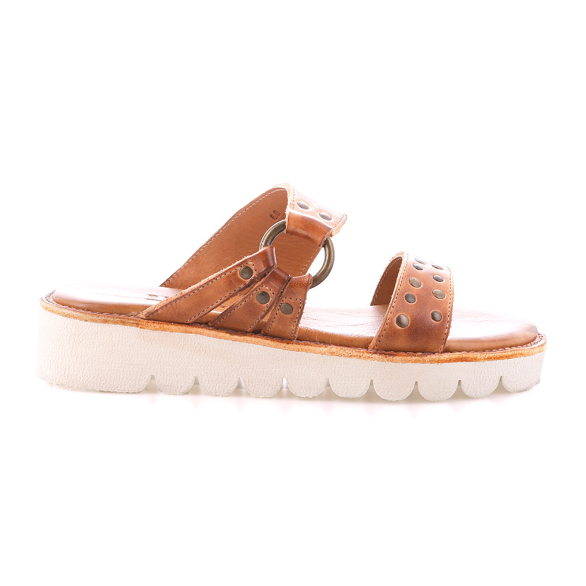 The Bed Stu Chow sandal features distressed leather, studded straps, and a chunky rubber sole, shown from the side against a plain background.