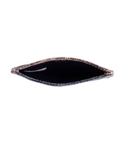 The Bed Stu Chuck is a slim, empty brown leather wallet photographed from above, displaying its open interior with no contents visible.