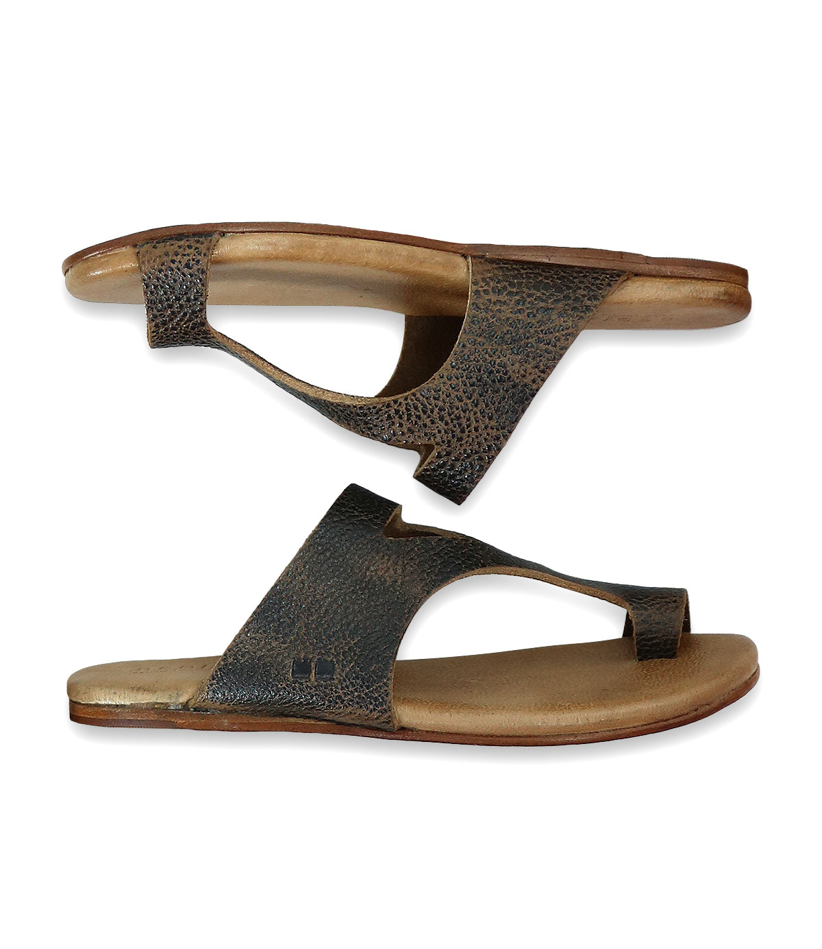 A pair of brown slip-on Civilized sandals by Bed Stu with a single wide strap and toe separator, crafted from exceptional quality materials, featuring a cushioned sole for added comfort, laying side by side on a white background.