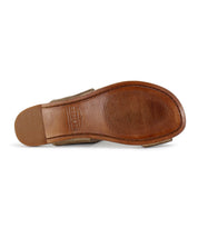 Bottom view of a single shoe showing a brown sole with a textured pattern and a small heel. The cushioned sole provides comfort, and the brand name Bed Stu is embossed on the sole. This particular shoe is named Civilized.