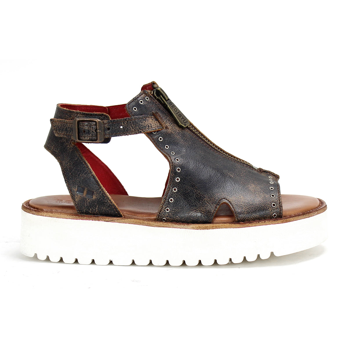 A women's brown leather sandal with a white XL EXTRALIGHT® sole named Clancy by Bed Stu.