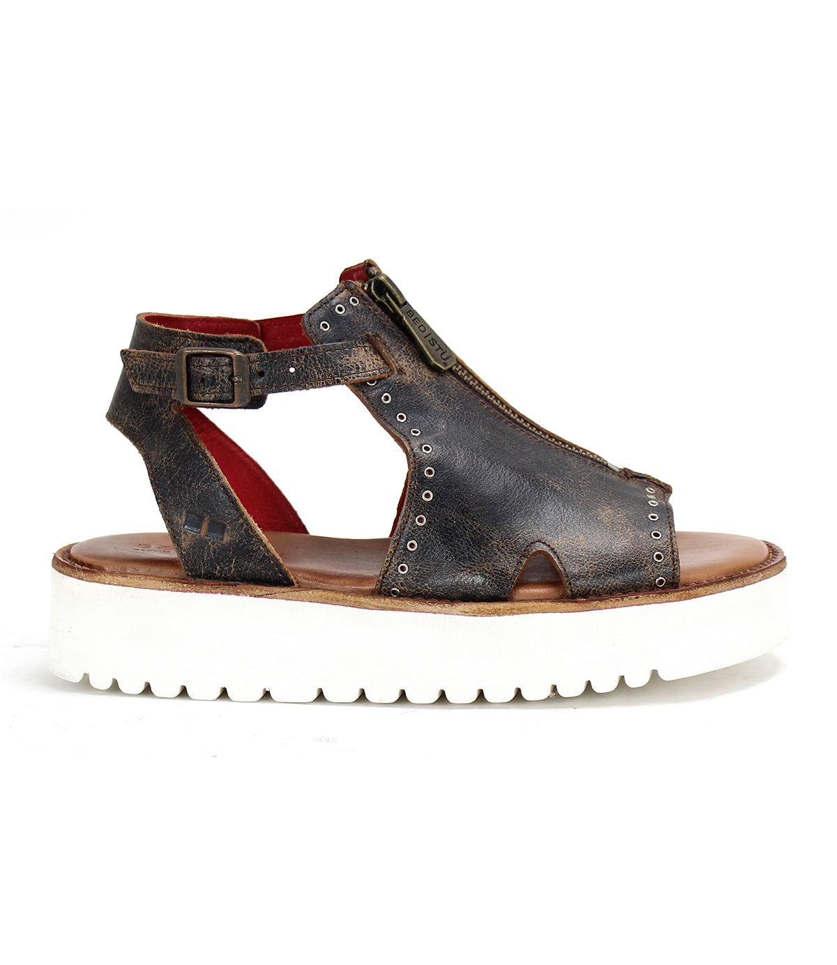 A women's brown leather sandal with a white XL EXTRALIGHT® sole named Clancy by Bed Stu.