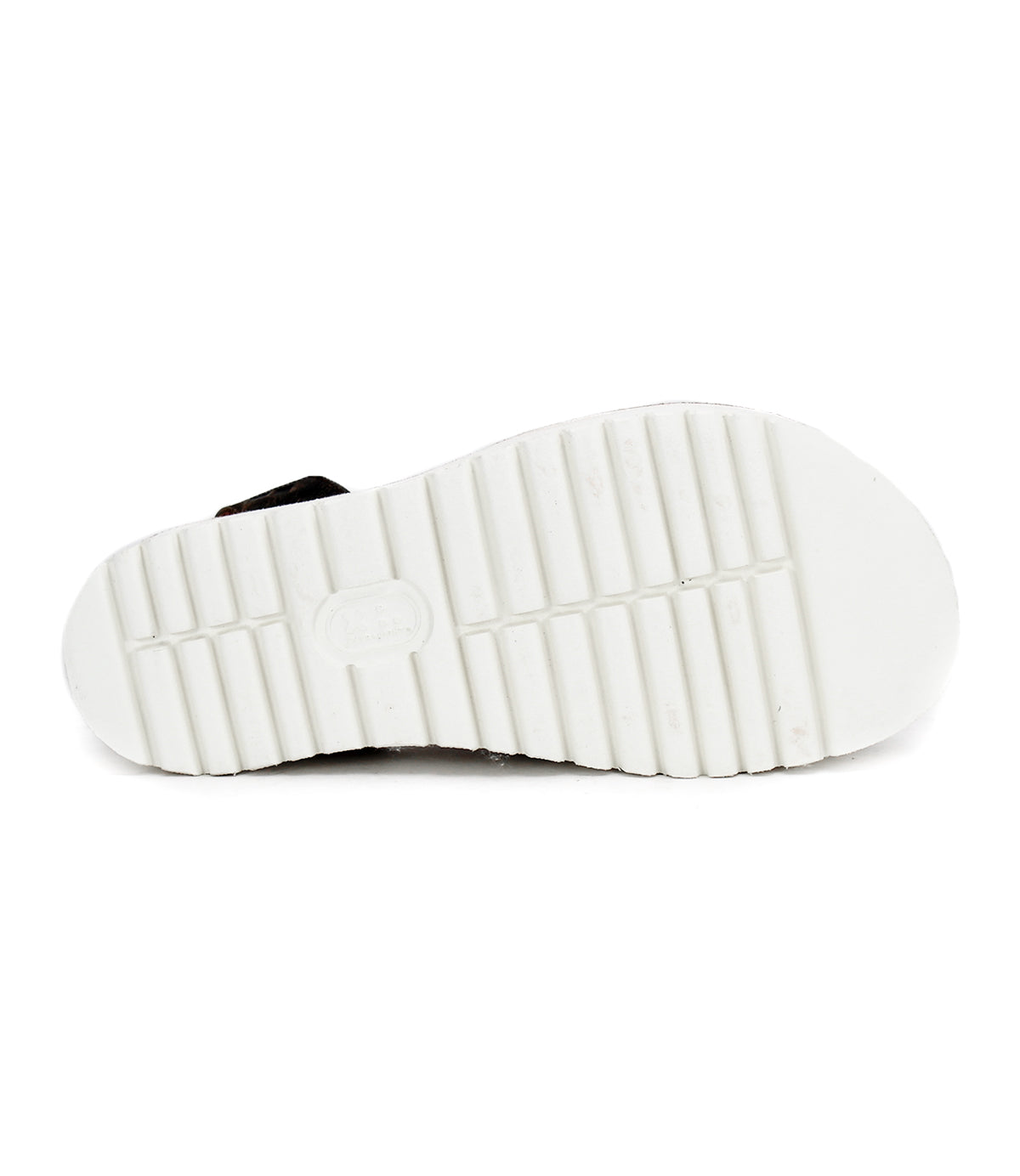 A pair of white sneakers with black soles on a white background, featuring shock absorbing Bed Stu Clancy technology.