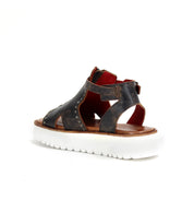 A women's Clancy sandal from Bed Stu with straps and a white sole featuring XL EXTRALIGHT® technology for shock absorbing.