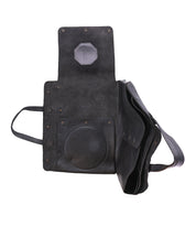 With its flap lifted, the Bed Stu Commuter reveals organized interior compartments, stitched leather detailing, and a dedicated laptop section—a stylish, versatile leather bag for everyday commuters.