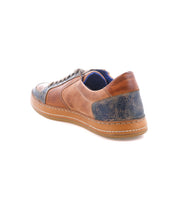 The Bed Stu Condor sneaker features brown and blue leather with laces, designed for comfort and durability, shown from a back angled view on a white background.