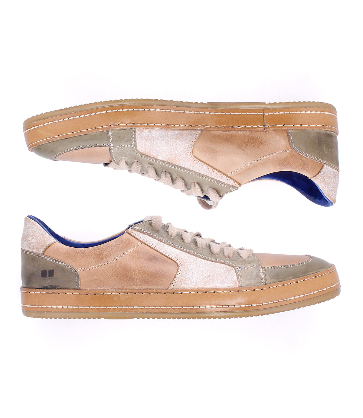 The Bed Stu Condor sneakers feature comfortable beige and light brown leather uppers with rubber soles, shown in a side view against a white background.