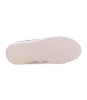 The image displays the bottom view of the Bed|Stü Cosmo sneaker’s white sole, featuring horizontal grooves and a central rectangular area.