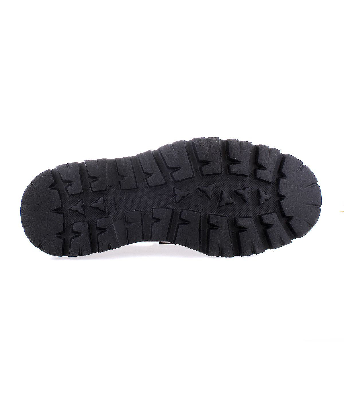 The image displays the sole of the Costruito penny loafer by Bed Stu, featuring a rugged, textured tread pattern designed for traction, and crafted in Italy.