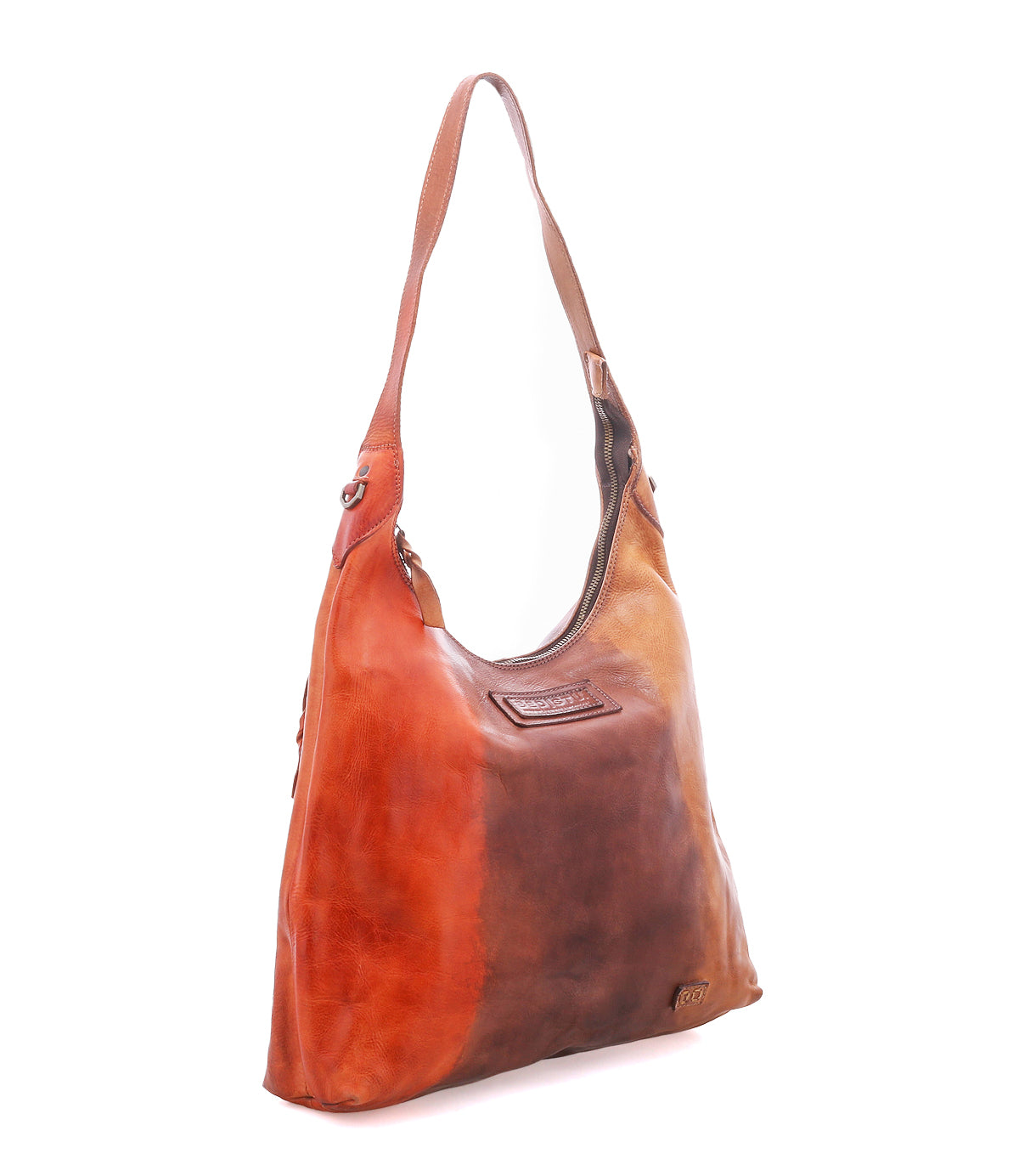 The Dallas LTC by Bed|Stü is a tri-color leather shoulder bag inspired by the classic holster bag silhouette, showcasing shades of orange, brown, and tan. It features a single strap and a soft, slouchy design.