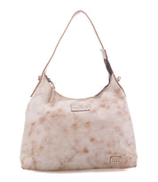 A small, light-colored full-grain leather Bed|Stü Decatur LTC hobo bag with a single shoulder strap and a top zipper closure.