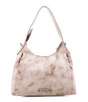 A small, mottled light-colored full-grain leather Decatur LTC hobo bag with a single shoulder strap and a branded metal plate at the base.