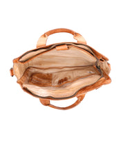The organized belongings inside a Depp by Bed Stu bag.