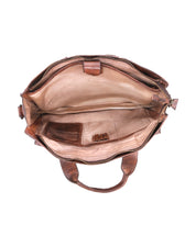 The Depp by Bed Stu inside a brown leather briefcase for one's belongings.