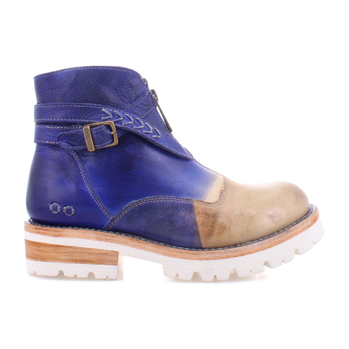 A lightweight blue leather ankle boot with crisscross straps and a white sole, called the Dessa made by Bed Stu.