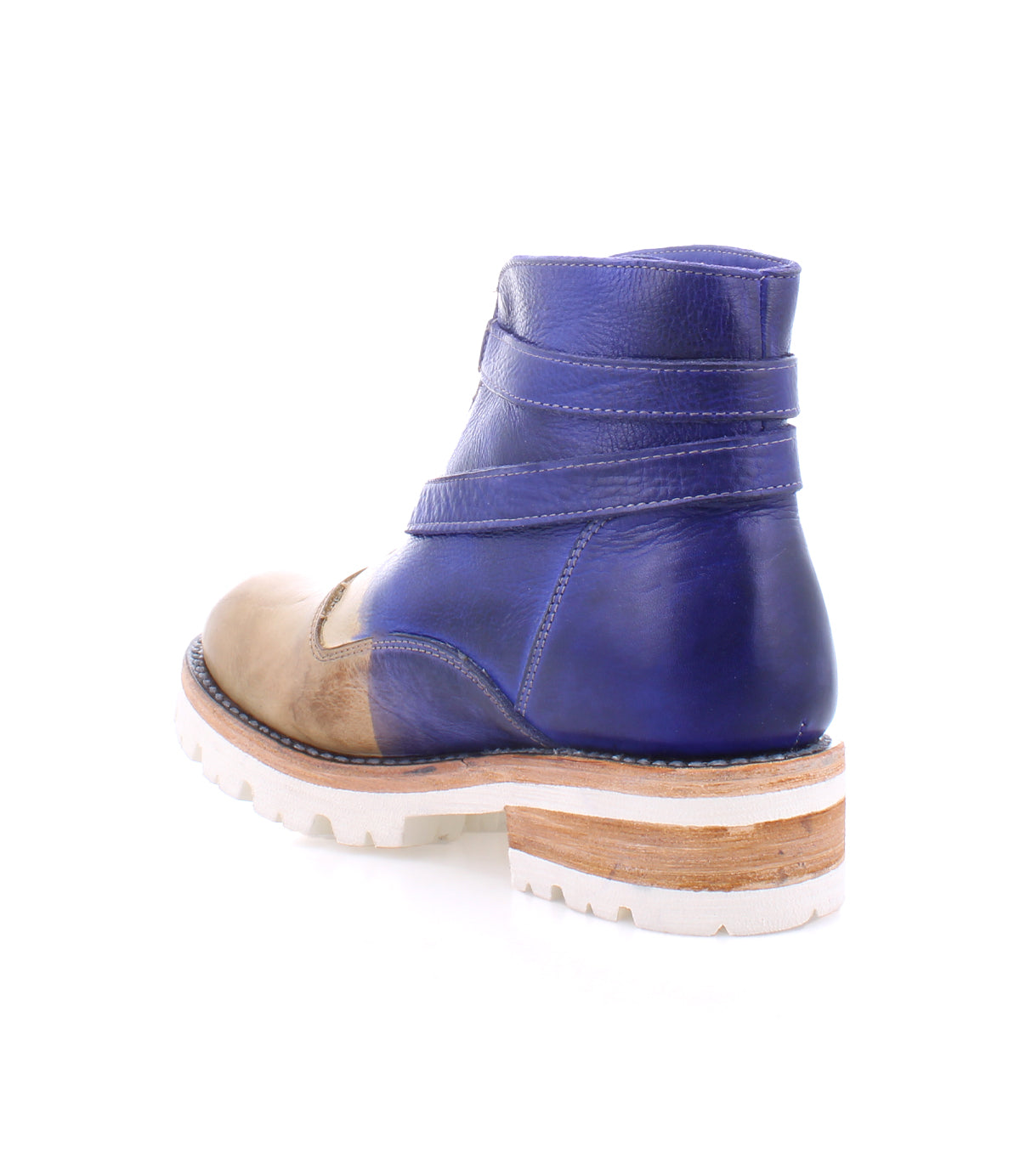 A pair of lightweight blue leather Dessa boots with crisscross straps and a white sole by Bed Stu.